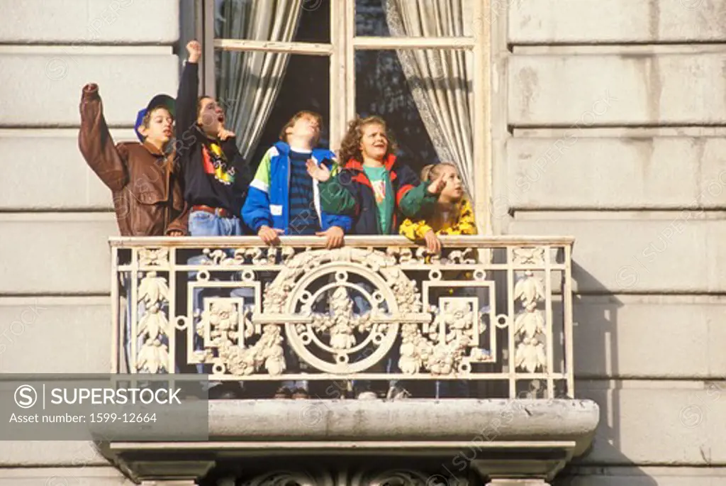 Children in balcony at Macy's Parade, Thanksgiving, New York, NY