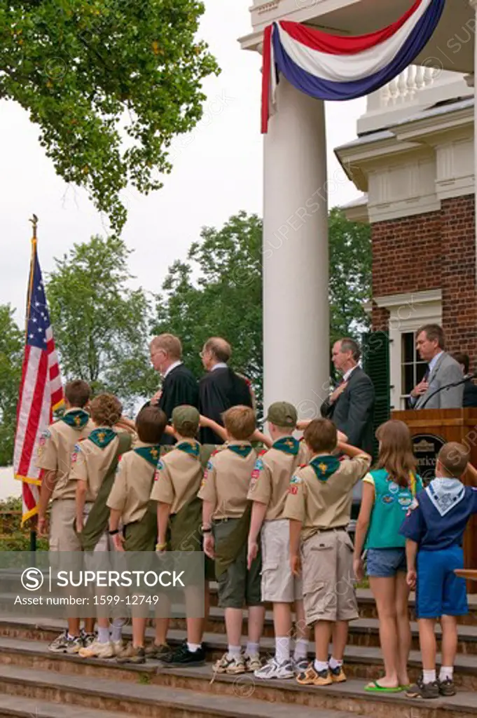 Boy Scouts and judge saying the Pledge of Allegiance with 76 new American citizens at Independence Day Naturalization Ceremony on July 4, 2005 at Thomas Jefferson's home, Monticello, Charlottesville, Virginia, on the anniversary of Jefferson's death day and the signing of the Declaration of Independence