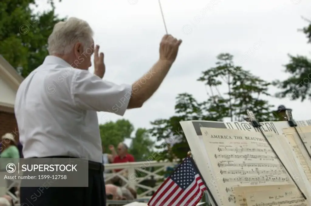 Conductor leading band for 76 new American citizens at Independence Day Naturalization Ceremony on July 4, 2005 at Thomas Jefferson's home, Monticello, Charlottesville, Virginia, on the anniversary of Jefferson's death day and the signing of the Declaration of Independence