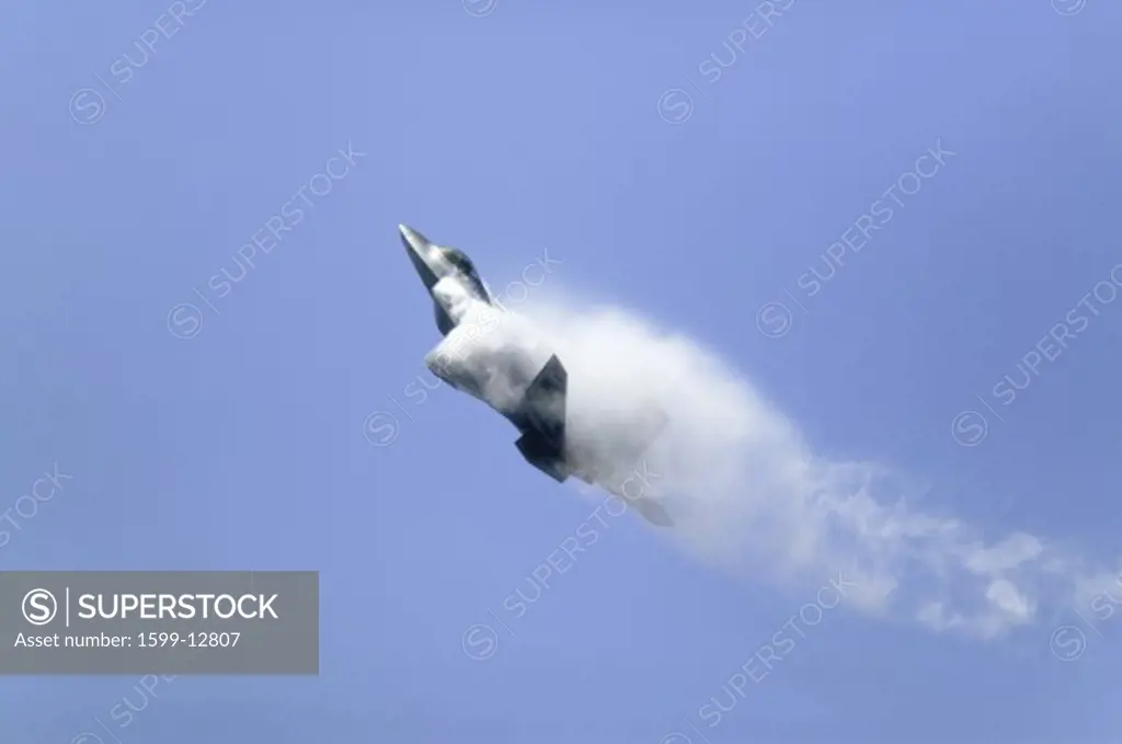 US Air Force F-22A Raptor Jet Fighter making extreme turn at the 42nd Naval Base Ventura County (NBVC) Air Show at Point Mugu, Ventura County, Southern California.