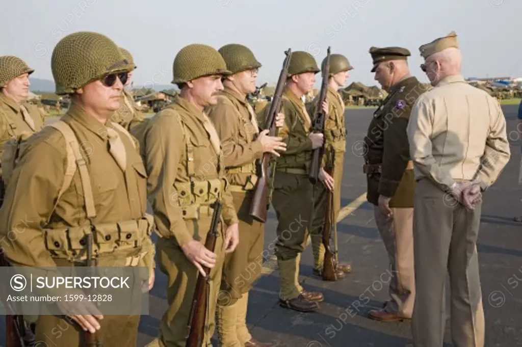 World War II Infantry troops standing at attention with General George Patton reviewing the troops at Mid-Atlantic Air Museum World War II Weekend and Reenactment in Reading, PA held June 18, 2008