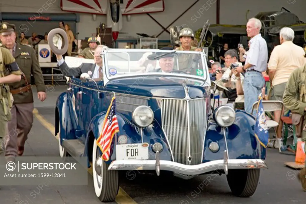 Actors portraying President Franklin D. Roosevelt (FDR) in Presidential limo with his wife Eleanor Roosevelt at Mid-Atlantic Air Museum World War II Weekend and Reenactment in Reading, PA held June 18, 2008