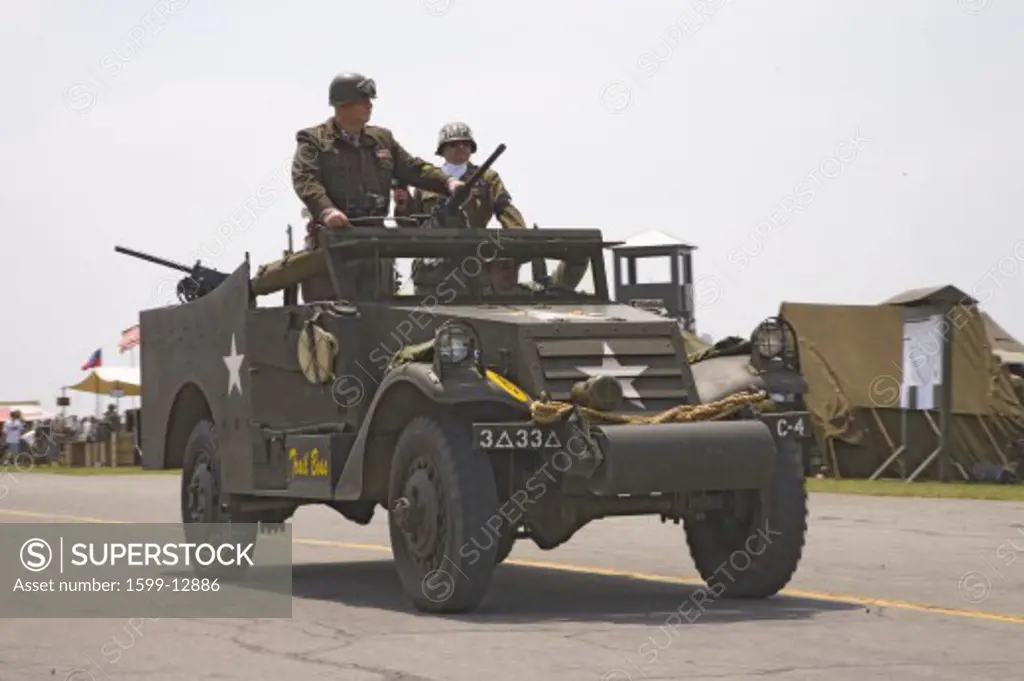 Actor of General George Smith Patton, Jr. stands up in jeep during reenactment parade of World War II in Reading, Pennsylvania, June 18, 2008