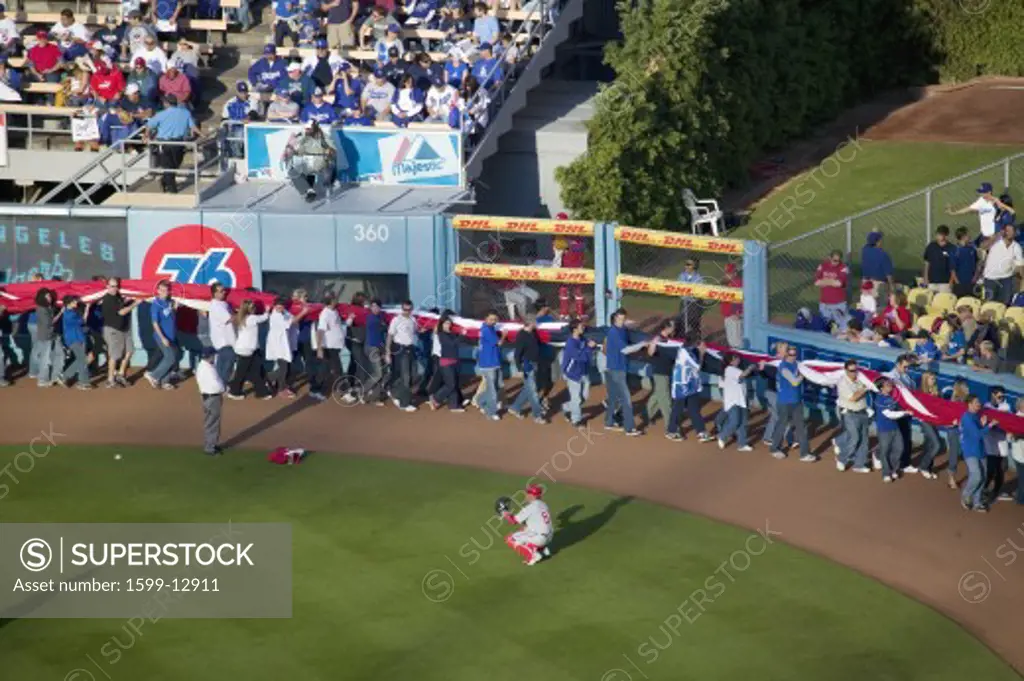 People carry giant American Flag for opening ceremony of National League Championship Series (NLCS), Dodger Stadium, Los Angeles, CA on October 12, 2008