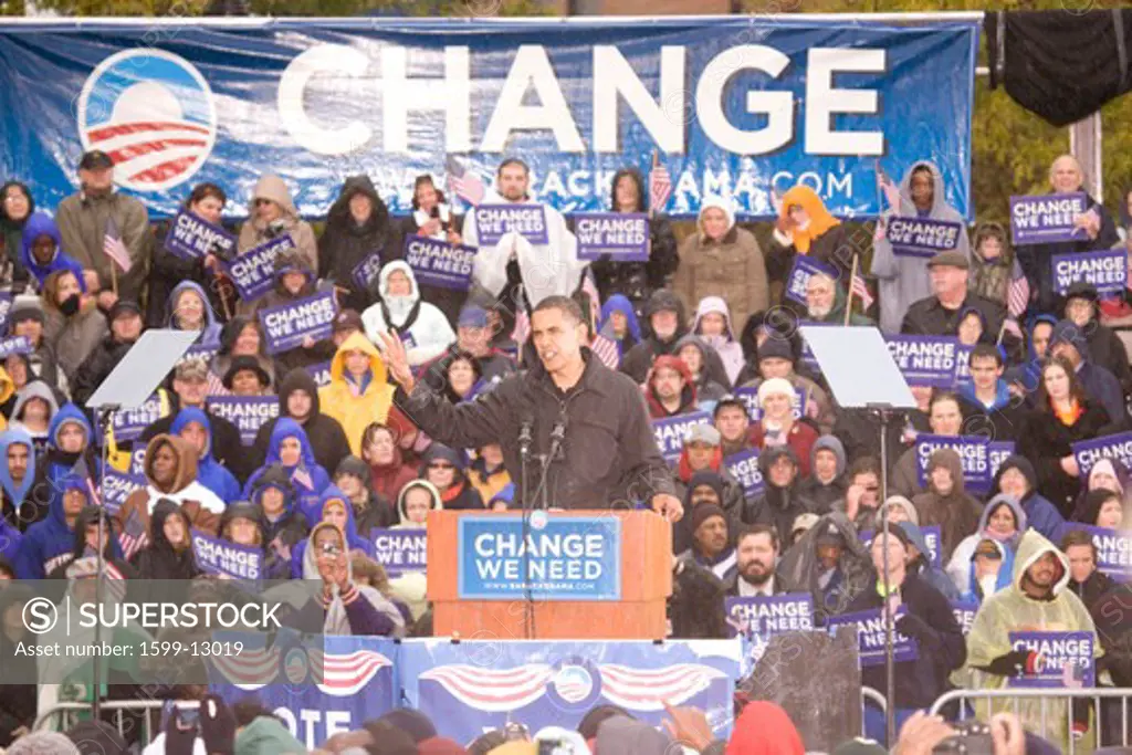 US Senator Barack Obama speaking at podium in pouring rain at Presidential Rally on October 28, 2008, at Widener University in Chester, PA