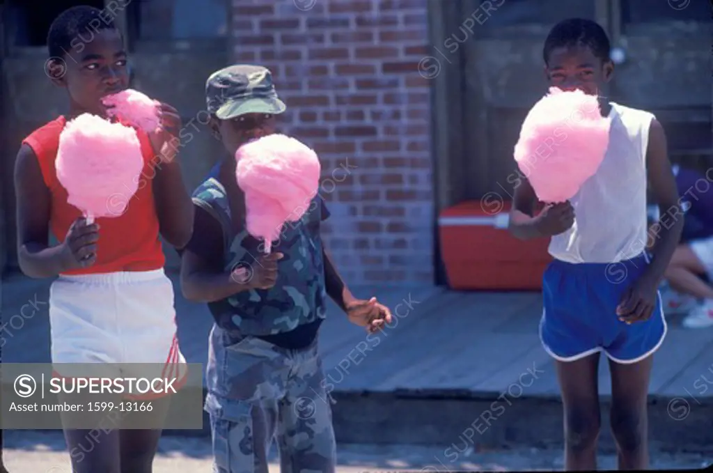 African-American children eating cotton candy, Natchez,MI