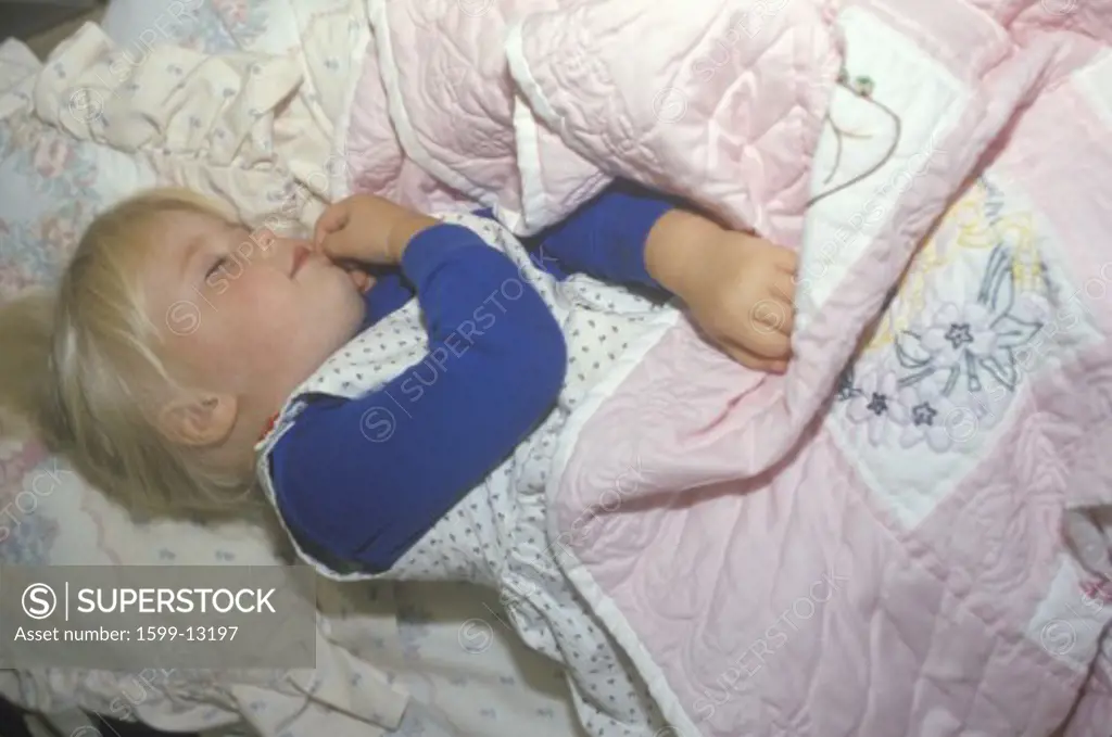 A little girl napping at a children's daycare center, Washington D.C.