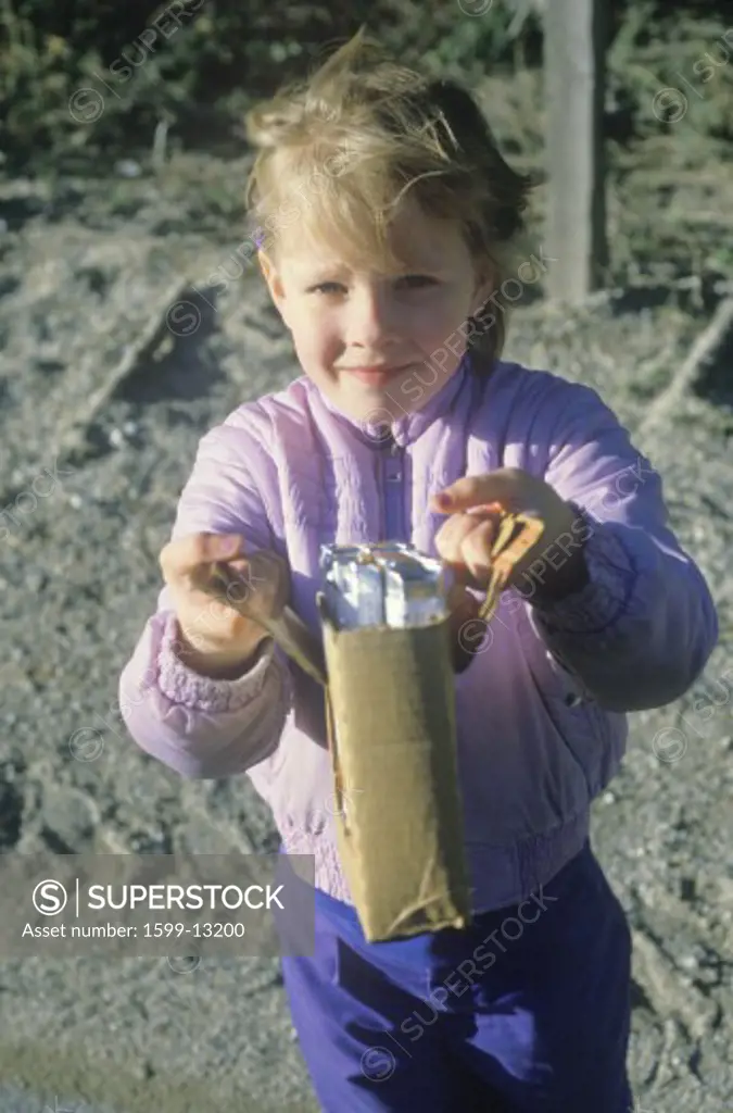 A young girl selling chocolate bars in Priest River, ID