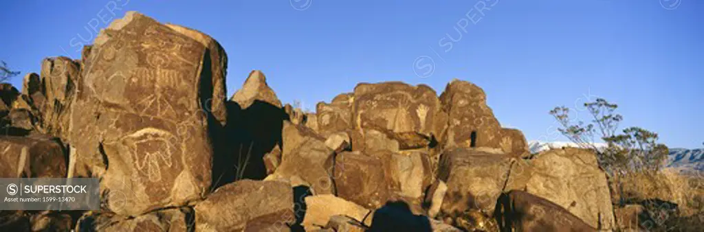 Panoramic image of petroglyphs at Three Rivers Petroglyph National Site, a (BLM) Bureau of Land Management Site, features more than 21,000 Native American Indian petroglyphs and examples of prehistoric Jornada Mogollon rock art, off Route 54, South of Carrizozo, New Mexico