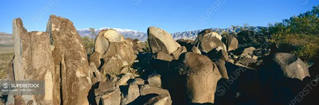 Panoramic image of petroglyphs at Three Rivers Petroglyph National Site, a (BLM) Bureau of Land Management Site, features more than 21,000 Native American Indian petroglyphs and examples of prehistoric Jornada Mogollon rock art, off Route 54, South of Carrizozo, New Mexico