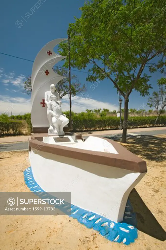 Memorial to Vicente Yañez Pinzón and his dying brother Martin Alonso aboard a ship with mast and sail, three red crosses adorn the sails, Palos de la Frontera (España) ,Spain