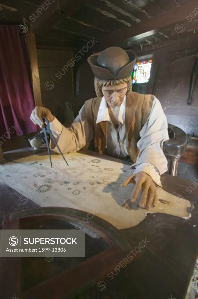 Model of Christopher Columbus at desk with map in his cabin at Muelle de las Carabelas, Palos de la Frontera - La Rábida, the Huelva Provence of Andalucia and Southern Spain, the site where Columbus departed from the Old World to the New World in August 3 of 1492