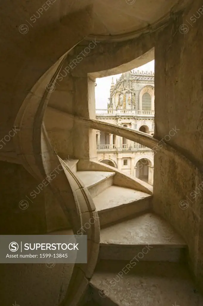 Circular stairway of the Convent of the Knights of Christ and Templar Castle, founded by Gualdim Pais in 1160 AD, is a Unesco World Heritage Site in Tomar, Portugal