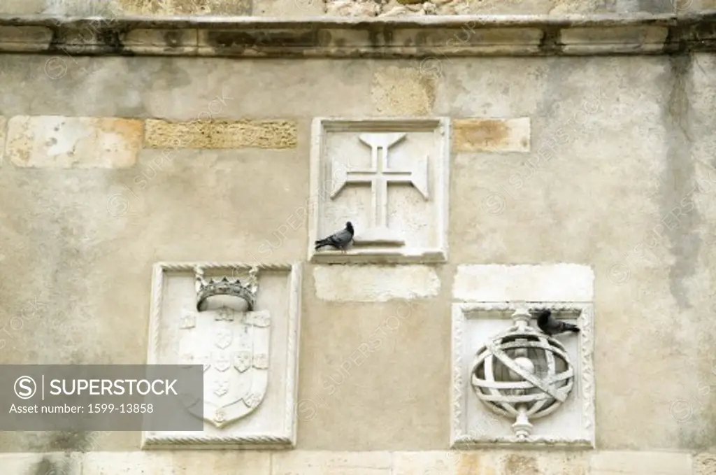 Detail shot of facade of the Igreja da Santa Maria dos Olivais, considered as the mother church of the Order of the Knights Templar in Portugal and the resting place of many of the past Masters, Tomar, Portugal