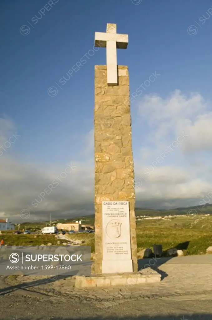 Monument at Cabo da Roca on the Atlantic Ocean in Sintra, Portugal, the westernmost point on the continent of Europe, which the poet Camões defined as 'where the land ends and the sea begins'.