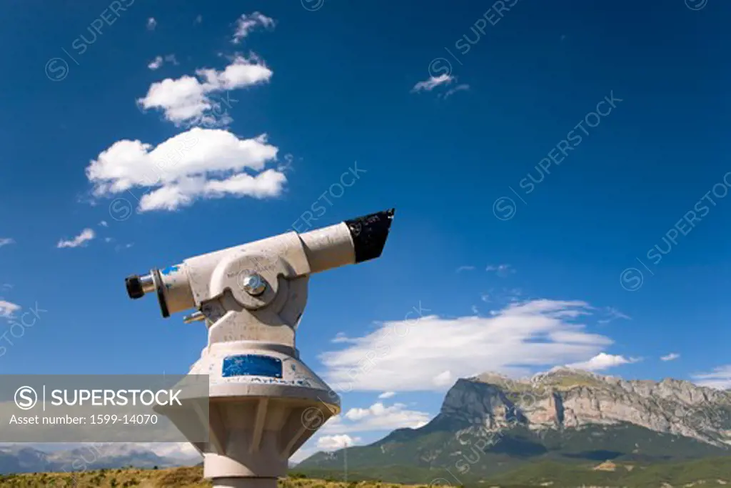 Telescope with sweeping hilltop views of Cinca and Ara Rivers from Ainsa, Huesca, Spain in Pyrenees Mountains, an old walled town near Parque National de Ordesa