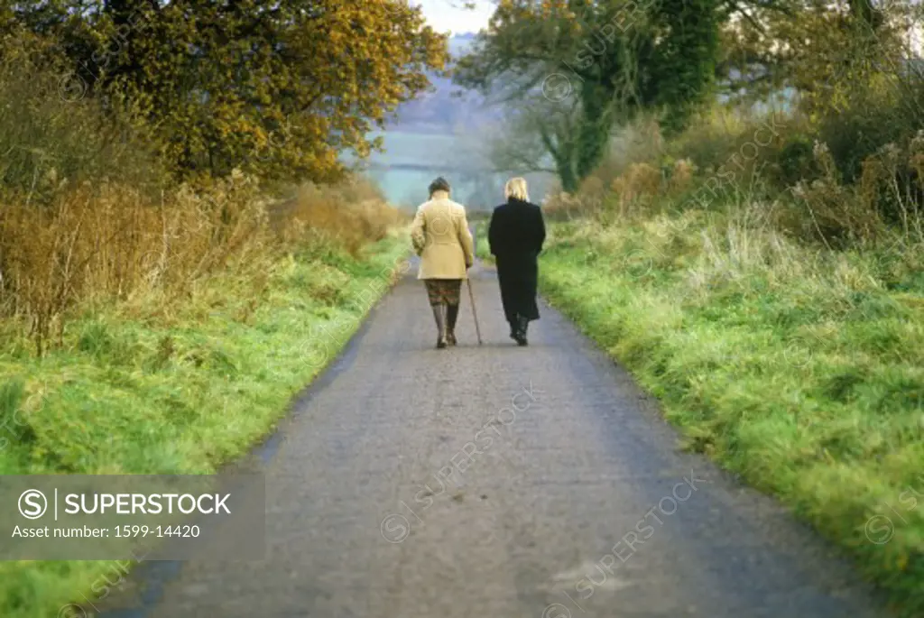 Two Women Walking in the English countryside