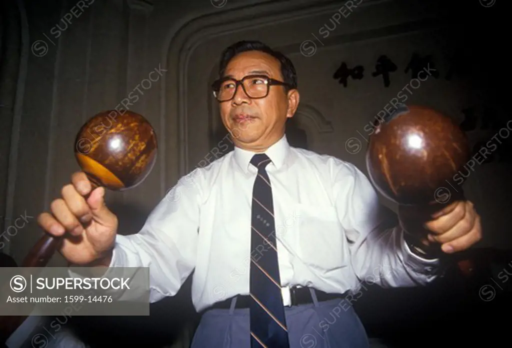 Musician with maracas in Old Jazz Band at Peace Hotel, Shanghai, People's Republic of China