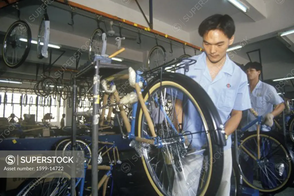 Factory workers at China Bicycle in Shenzhen in Guangdong Province, People's Republic of China
