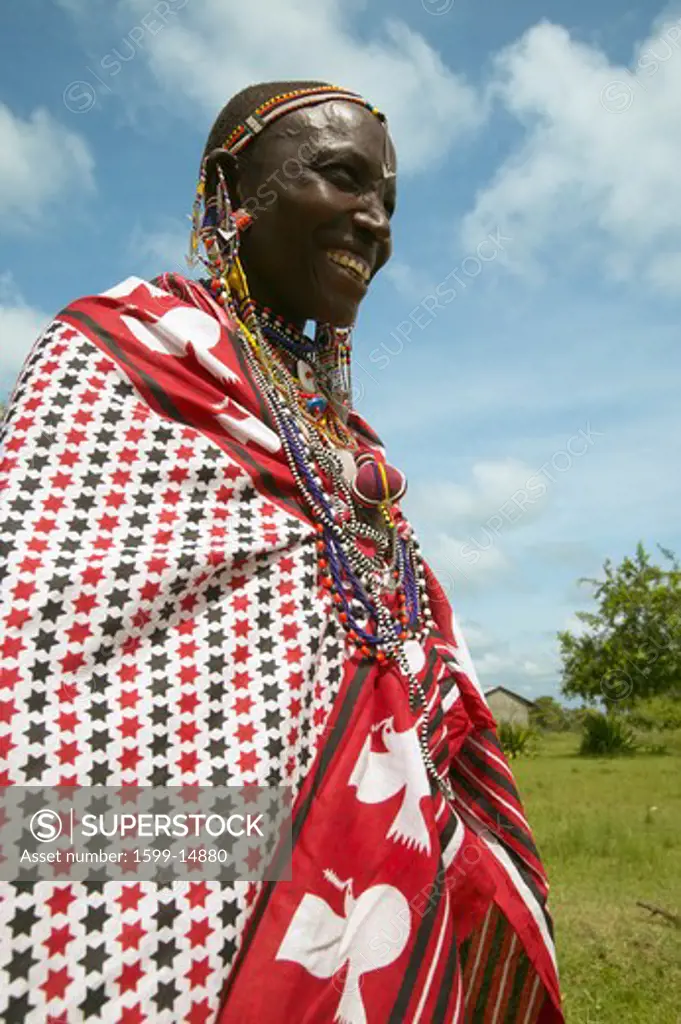 Masai female in robe in village near Tsavo National Park, Kenya, Africa