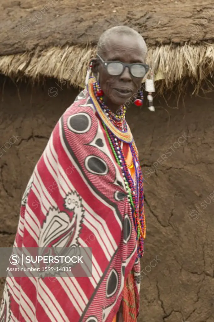 Masai Senior Elder man with eyeglasses in village near Tsavo National Park, Kenya, Africa