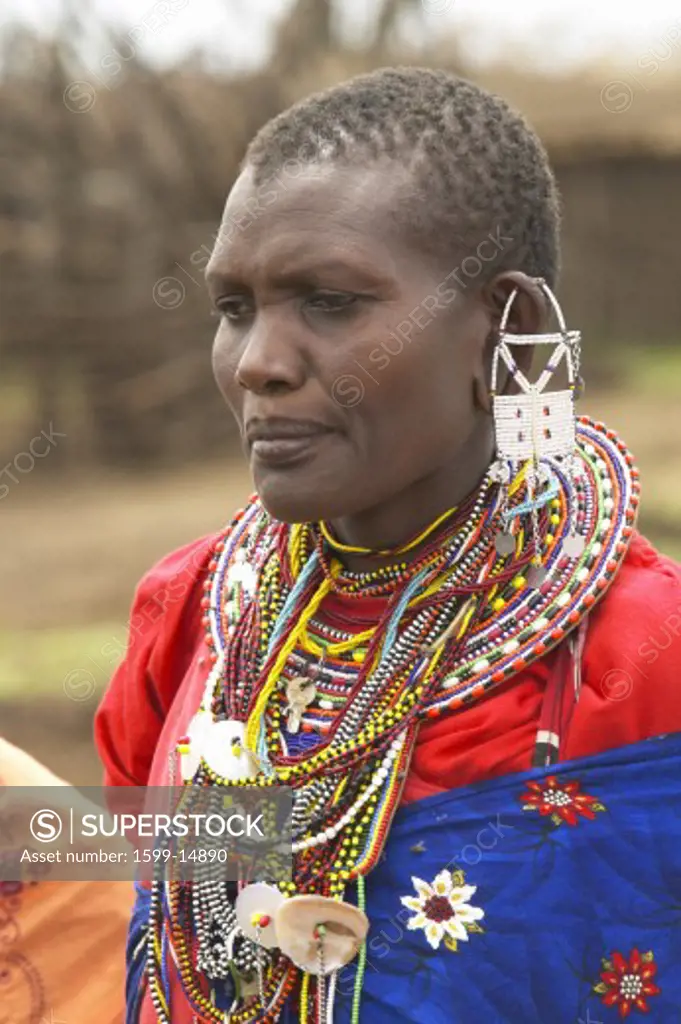 Masai female in robe with beads in village near Tsavo National Park, Kenya, Africa