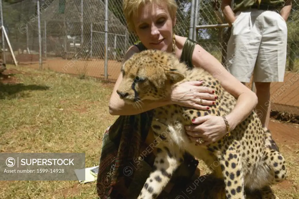 Melody Taft of Humane Society of US visits Cheetah in animal facility of Nairobi, Kenya, Africa at the KWS Kenya Wildlife Service