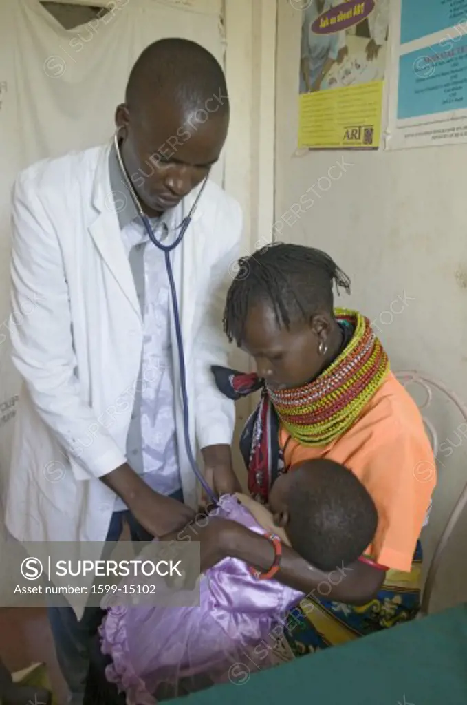 A doctor checks mother and children for HIV/AIDS at Pepo La Tumaini Jangwani, HIV/AIDS Community Rehabilitation Program, Orphanage & Clinic.  Pepo La Tumaini Jangwani (wind of hope in the arid place) offers hope, support and care for orphan and vulnerable children living with HIV/AIDS in Nairobi, Kenya, Africa