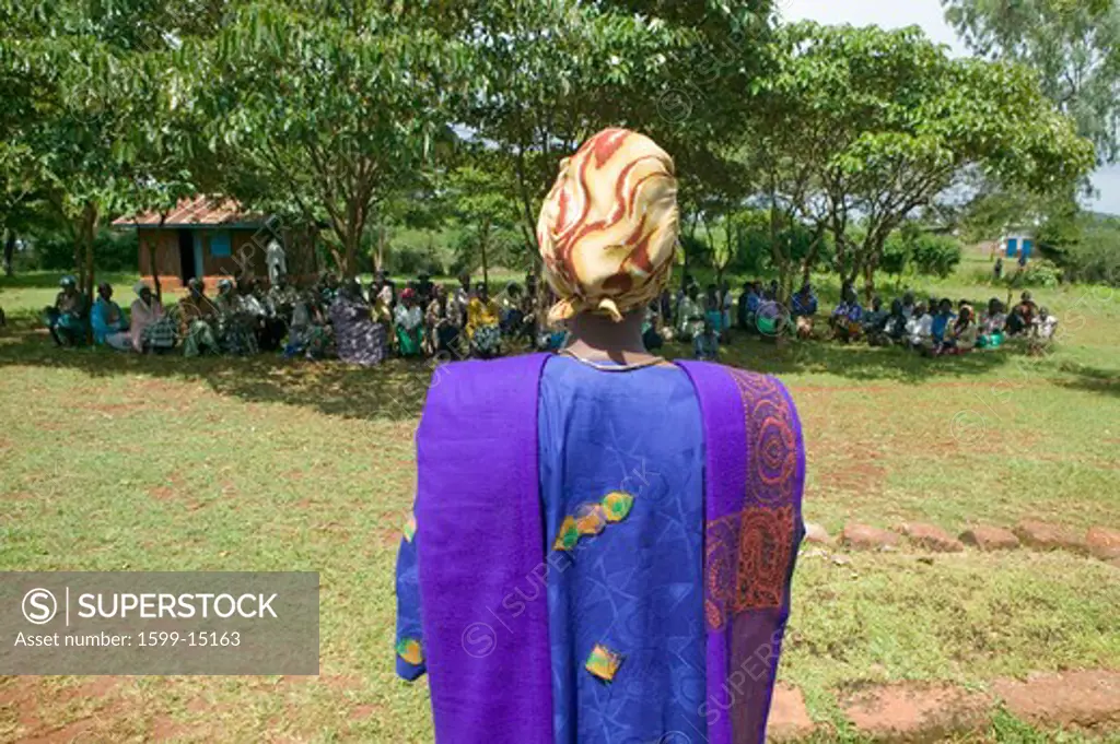 Sarah Kilemi, wife of Parliament member Kilemi Mwiria, speaks to 'Women without Husbands' women who have been ostracized from society or who have lost their husbands and only have themselves as a group to look after each other in Meru, Kenya, Africa