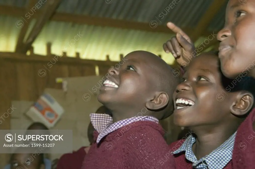 Karimba School with school children smiling in classroom in North Kenya, Africa