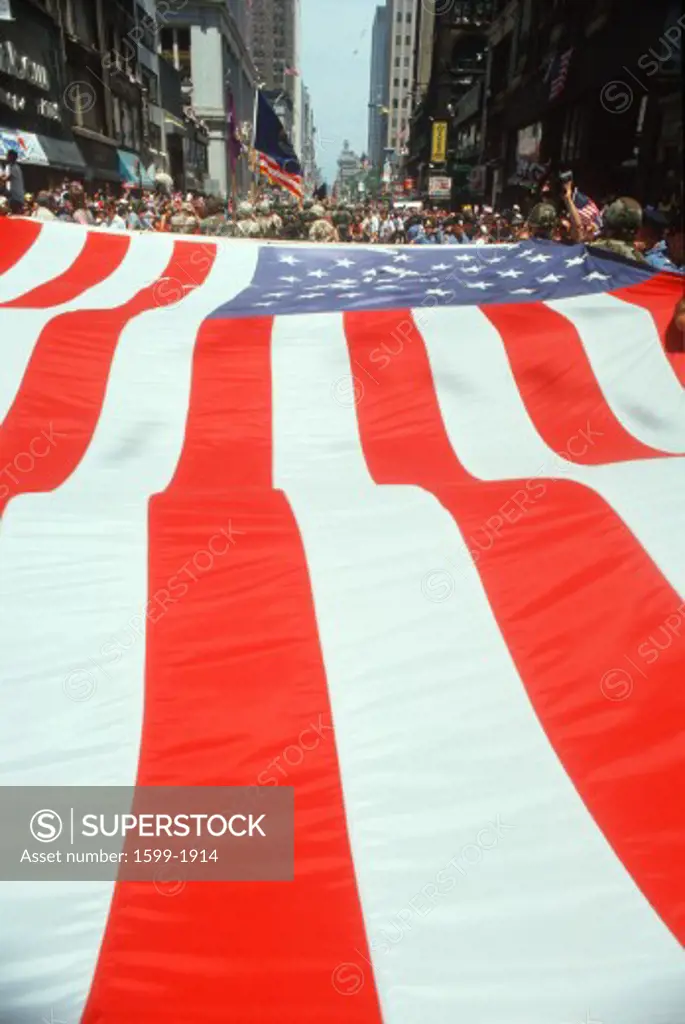 Large U.S. flag at Desert Storm Victory ticker tape parade, New York City, New York
