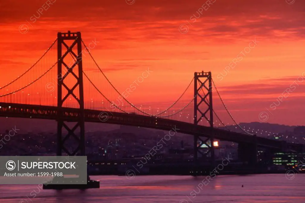 View of Bay Bridge from Treasure Island at sunset, San Francisco, California