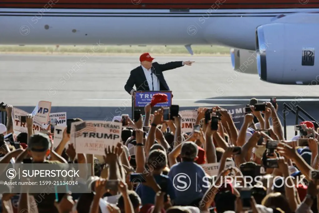 SACRAMENTO, CA - JUNE 01, 2016: Republican Presidential candidate Donald Trump speaks at a campaign rally in airport hanger in Sacramento, California