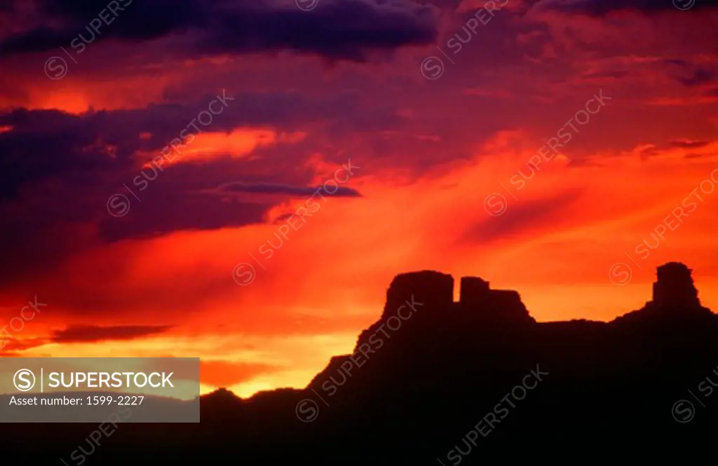 Silhouetted Indian ruins, Chaco Canyon at sunset, New Mexico