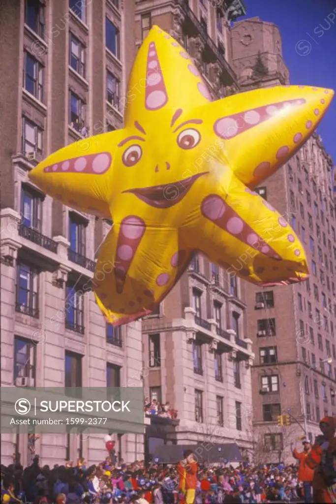 Yellow star balloon at Macy's Thanksgiving Day Parade