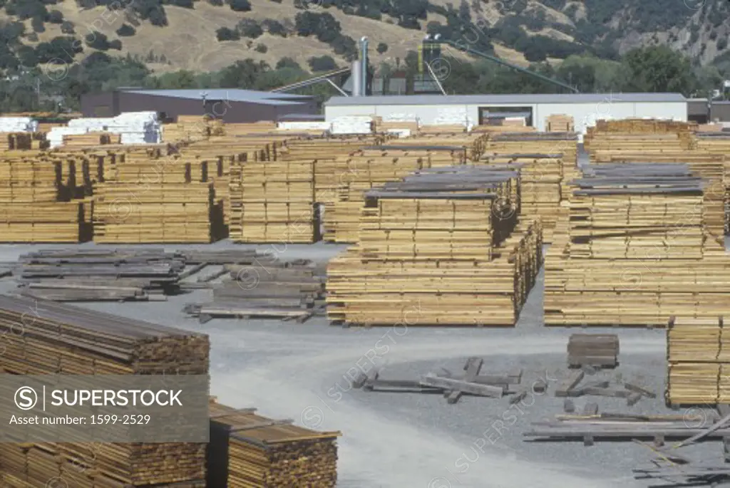 Cut lumber stacked at a lumber mill in Willits, California 