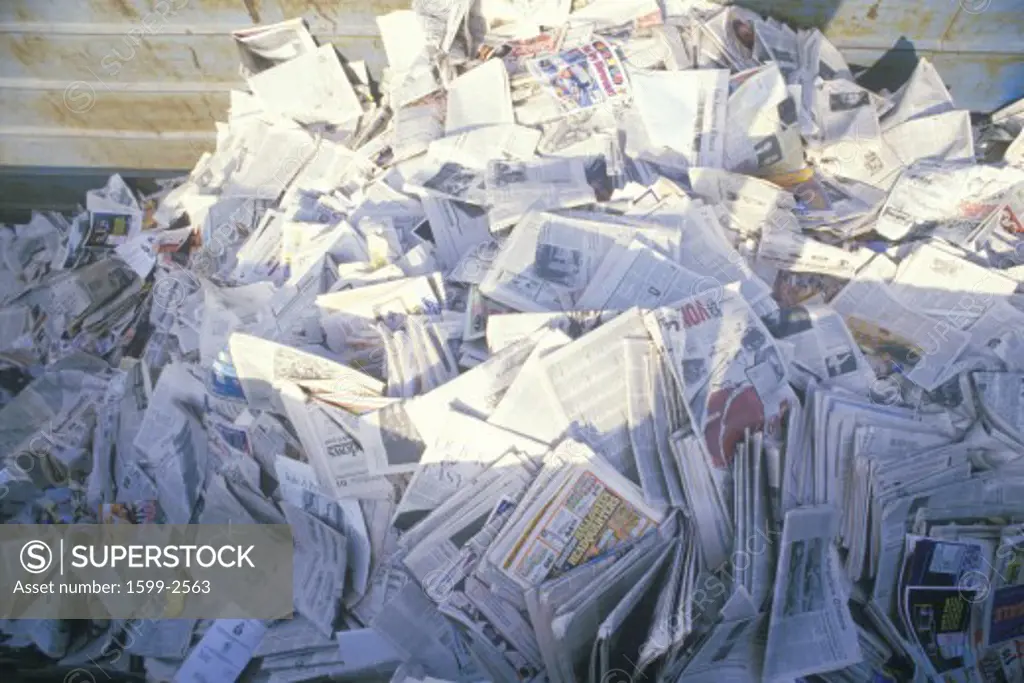 A pile of newspaper waiting for recycling in a bin at the Santa Monica Community Center, CA
