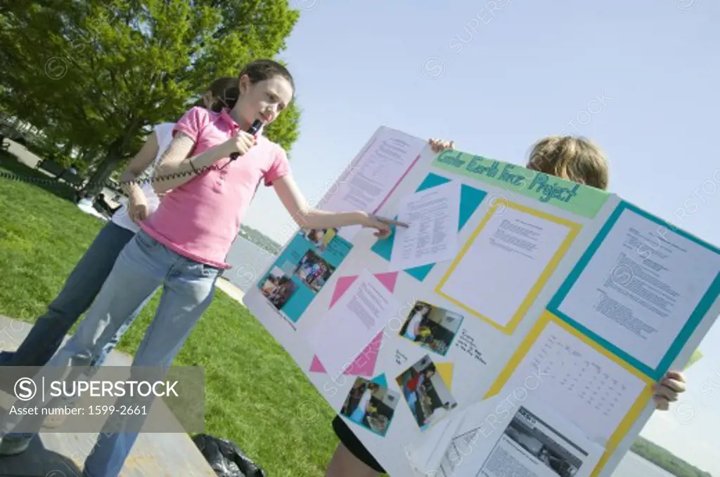 Female student discusses Earth Force environmental Project on Earth Day, Alexandria, Virginia