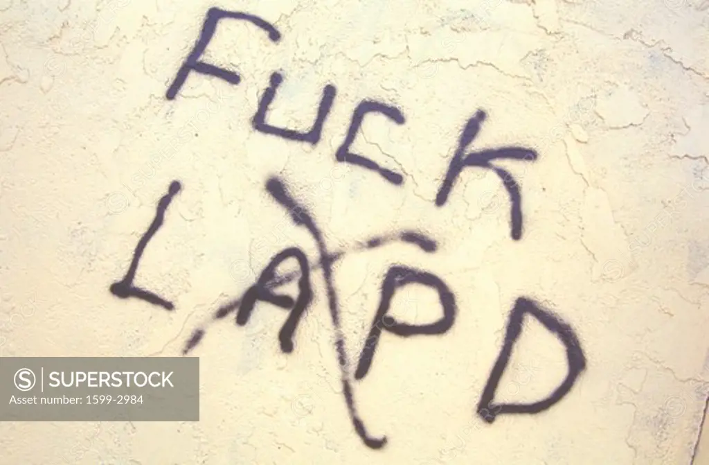 Graffiti with profanity towards Los Angeles Police Department, South Central Los Angeles, California
