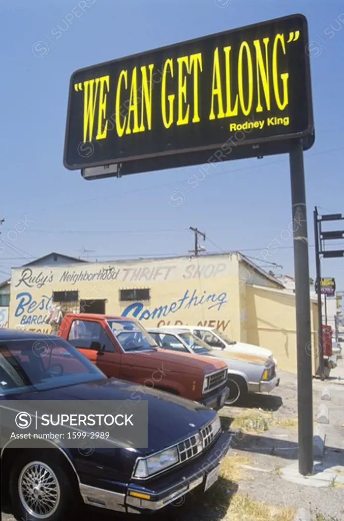 Billboard reading We can get along”, South Central Los Angeles, California