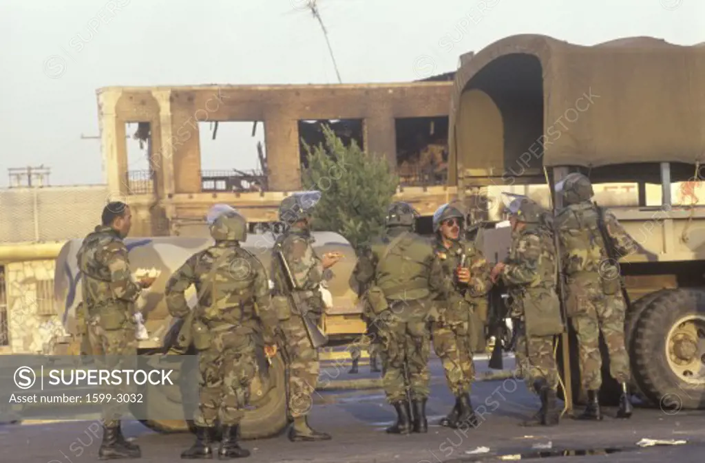 National Guardsmen taking meal break, 1992 riots, South Central Los Angeles, California