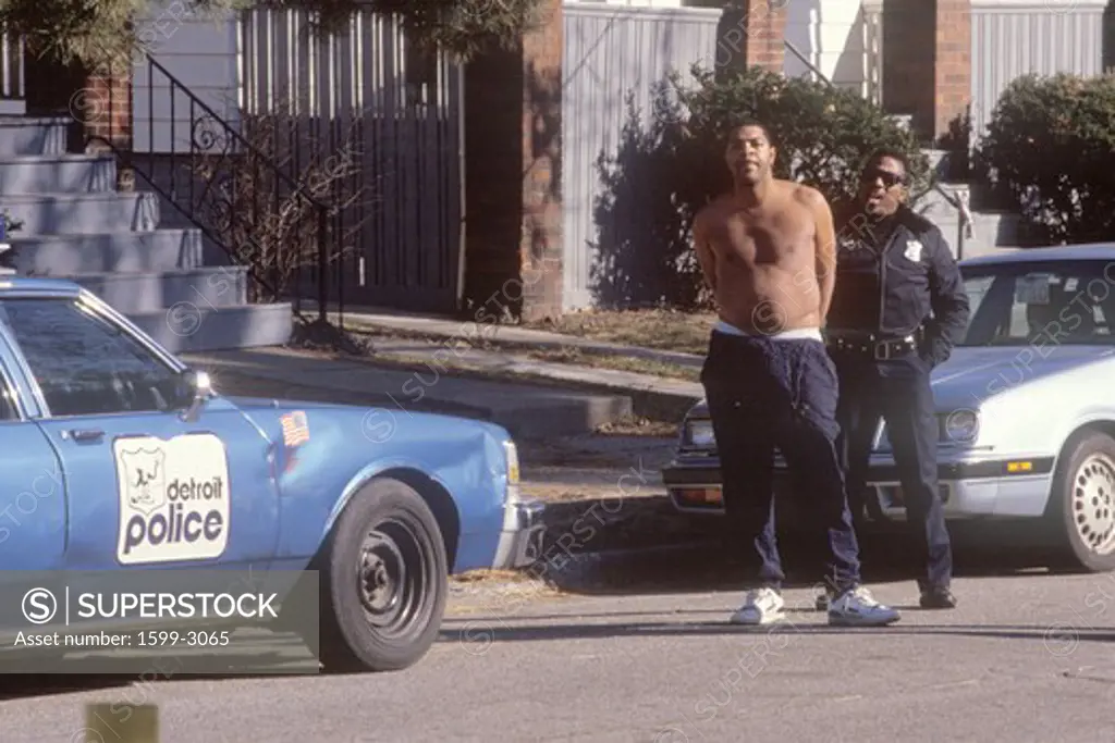 Gang member being arrested, Detroit, Michigan
