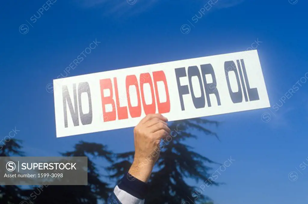 Sign No blood for oil” at peace rally,  Los Angeles, California