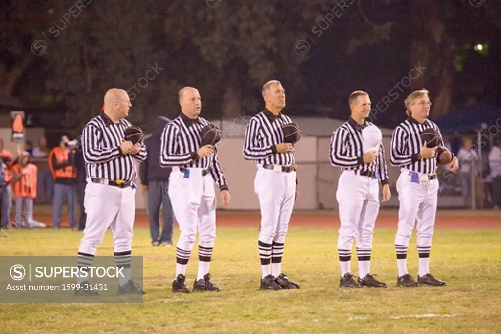 High school football referees pledge of allegiance for Ojai Nordhoff Rangers Football team who defeated Verbum Dei Eagles 21-0 on November 19, 2010, Ojai, CA, USA