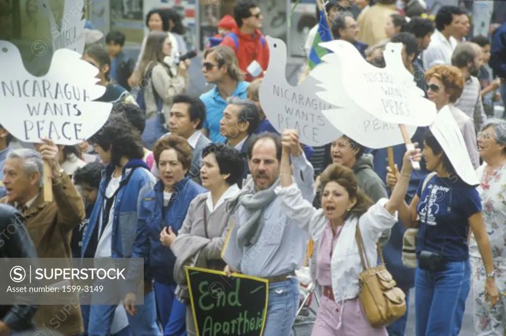 Marchers protesting US intervention In El Salvador, Los Angeles, California
