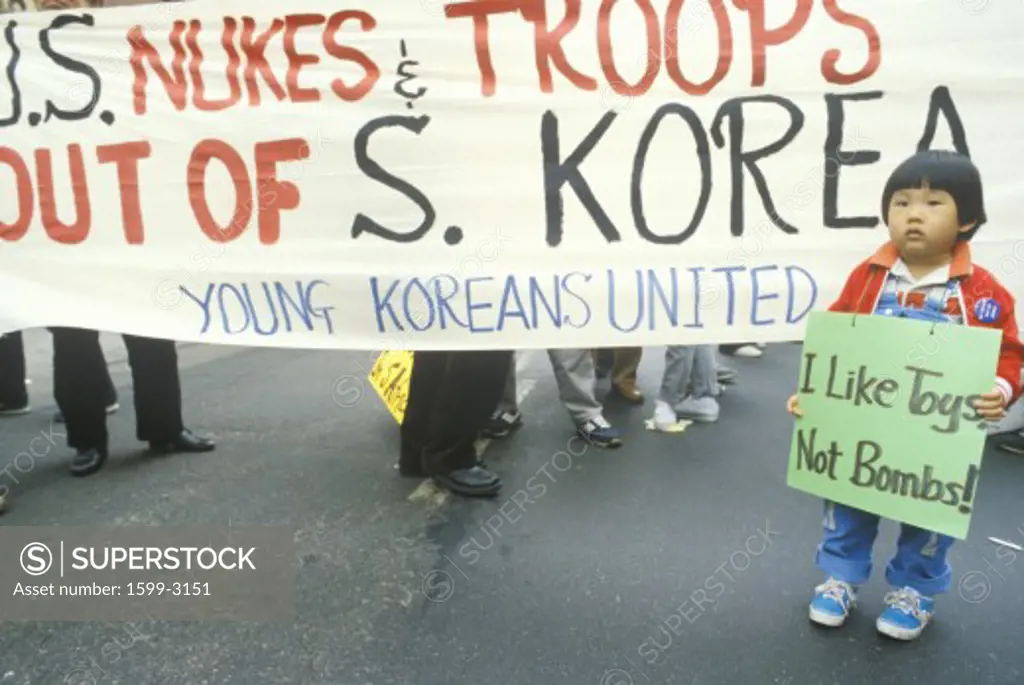 Marchers protesting US intervention In South Korea, Los Angeles, California