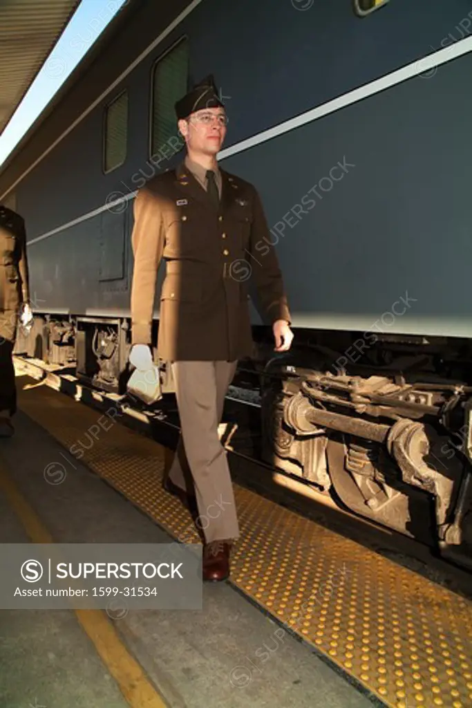 1940's reenactor walks along Pearl Harbor Day Troop train reenactment from Los Angeles Union Station to San Diego