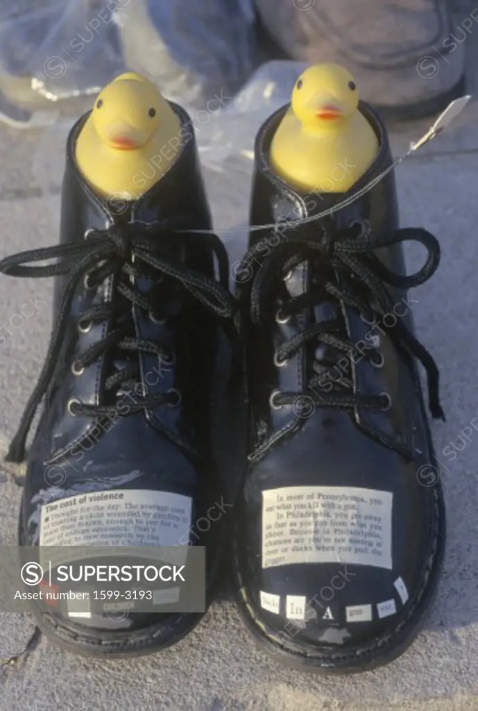 Pair of black shoes as symbol of gun violence, Washington D.C.