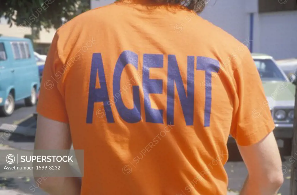Anti-war protester wearing Agent Orange” t-shirt