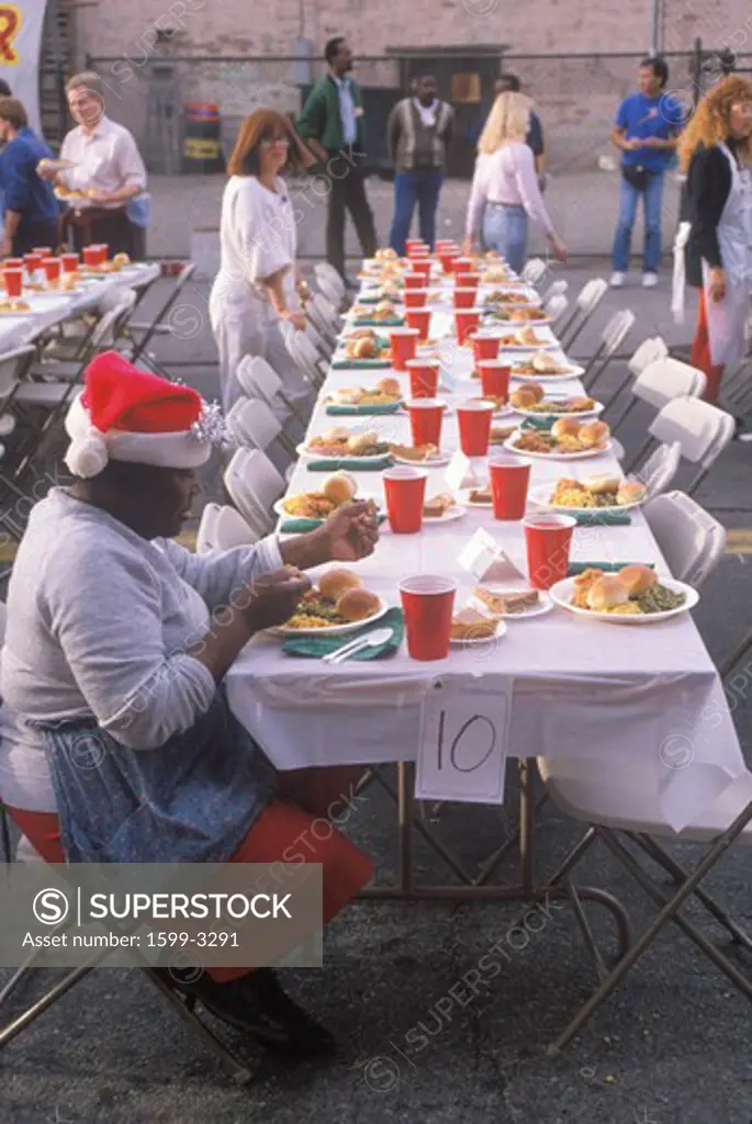 Tables of food for the homeless at Christmas, Los Angeles, California